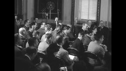 Pres. Harry Truman celebrates his 68th birthday by conducting his usual press conference and poses with family for the press News Clip