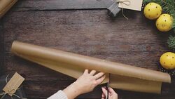 Swedish woman wrapping Christmas presents Stock Footage