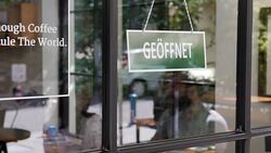 GEÖFFNET - Open sign in German language Stock Footage
