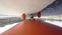 Under skateboard upside down POV - A person skating on a highway road Stock Footage