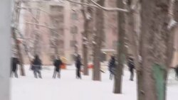 Sky News reporter on streets in Moscow with riot police standing near the prison where Alexei Navalny is detained News Clip