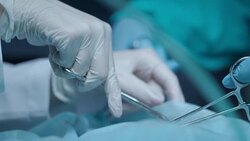 Surgery hands performing operation. Surgery hands at medical operation Stock Footage