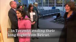 First refugees arrive to warm welcome News Clip