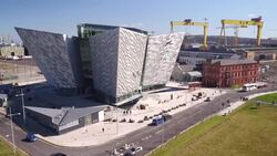 Drone aerials of Titanic Belfast and Harland and Wolff shipyard News Clip