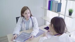 Professional Asian doctor medical professionals team brainstorming in a meeting. Team of healthcare workers discussing in boardroom at hospital. Health care and assistance concept. Stock Footage