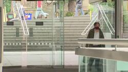 People shopping wearing face masks in Edinburgh News Clip