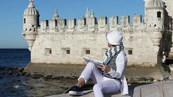 Female tourist studying a map Stock Footage