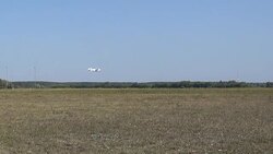 Takeoff of a light aircraft over the airfield Stock Footage