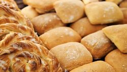 Showcase of cakes, breads, pastry in window display canteen for tasty desert food Stock Footage