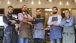 Confident team of hairstylists at hair salon Stock Footage