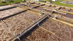 Aerial view to sewage treatment plant. Grey water recycling. Waste management theme. Stock Footage