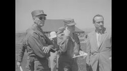 During Korean War, Indian officer arriving in South Korea with Indian soldiers talking to US officers and UN official News Clip