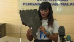 Relatives hand over what they believe is MH370 debris found in Madagascar Instructional Video