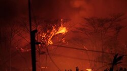 Night shots of lava burning roads and forests after Kilauea volcano eruption News Clip