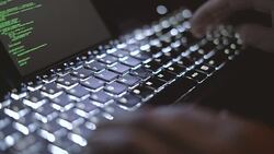 Hacker and keyboard Stock Footage
