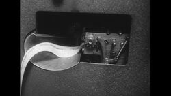 WASHINGTON DC c.1951 : A list of detained American servicemen are printed in the Pentagon during war and their next of kin are contacted Stock Footage