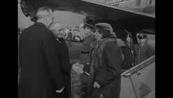 After attending NATO meeting in Paris, Secretary of State Dean Acheson returns home and is greeted by President Harry Truman in Washington, DC News Clip