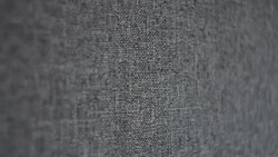Dolly Shot. Camera sliding over textured gray linen canvas fabric Stock Footage