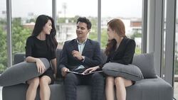 business team conference are  Discussion Meeting and analyzing and planning strategy business.Group of coworker  sitting and thinking a new ideas to success Stock Footage