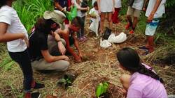 Kids plant trees to save the planet News Clip