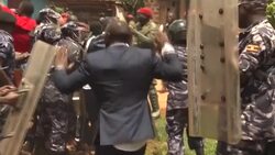 CLEAN : Uganda's Bobi Wine being detained after filing presidential candidacy News Clip