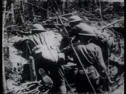 US troops in trenches in France, 1918. Use of machine gun, grenade, rifle. Stock Footage