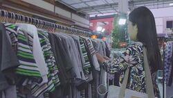 Woman at Clothing Store Stock Footage