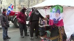 CLEAN : Volunteers serve food to Canadian truckers protesting against Covid rules News Clip