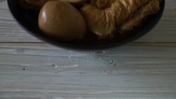 hard-boiled egg in brown sauce or sweet gravy sauce with tofu Stock Footage