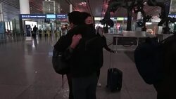 CLEAN : Expelled American reporters leave China News Clip