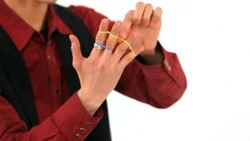 How to Do the Jumping Rubber Band Office Magic Trick Instructional Video