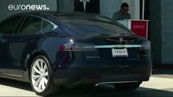 Tesla self-driving car moves News Clip