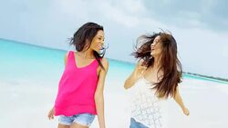 Happy African American Asian Chinese girls on vacation Stock Footage