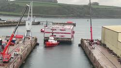 Migrant barge arrives in UK as docking port reportedly fears far-right protests News Clip