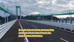 Watch: World’s tallest bridge opens in China. It's nearly 9 times higher than the Golden Gate Bridge News Clip