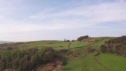 Drone aerials of farmland around Llandudno News Clip