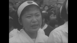 Demonstration for unification in Seoul, South Korea; women breaking through barrier guarded by soldiers News Clip
