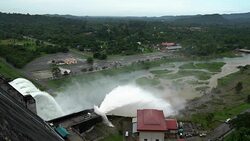 Water spills over the top of Dam Stock Footage