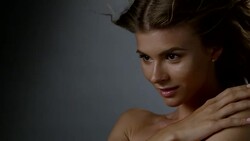 Close-up of a blond fashion model`s face. Fashion video. Stock Footage