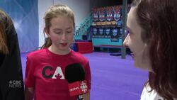 Barriers disappear, spirits soar as gold-medal cheer squad heads to Orlando for world championship News Clip