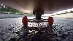 Under skateboard  POV - People skating on a highway road. Stock Footage