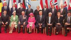 Queen meets Merkel at D-Day event, family photo News Clip