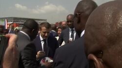 Ambient: Macron meets Drogba at sporting event in Abidjan News Clip