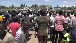 CLEAN : Coronavirus: Kenya police use tear gas to shut down minibus services News Clip
