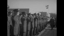 Pres. Dwight Eisenhower and first lady Mamie walk through honor guard to Dwight D. Eisenhower Presidential Library & Museum News Clip