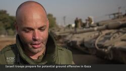 Israeli troops await orders along the Gaza border News Clip