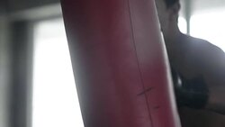 Slo mo : Punching bag workout Stock Footage