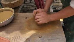Potter kneads clay mass, preparing to make a ceramic pot or jug. Stock Footage