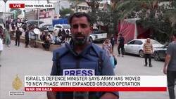 Palestinians break into Gaza UN aid warehouses as toll tops 8,000 News Clip