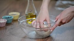 Hands knead the dough for bread in a bowl. Stock Footage